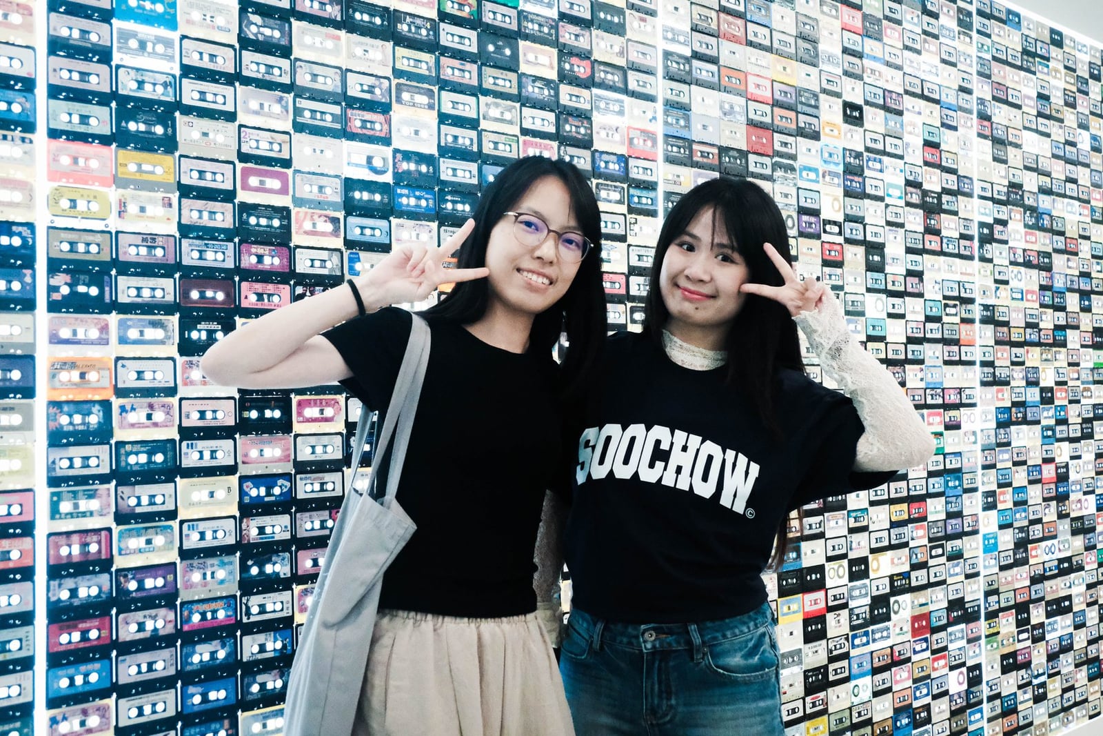 Soochow Winter Academy students exploring a community arts wall